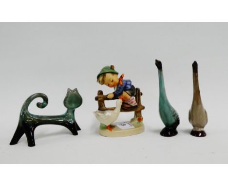 Hummel figure 'Farmyard Hero', together with green glazed earthenware cat and two duck figures, (4) 