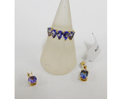 9 carat gold tanzanite five stone set dress ring and two tanzanite set and 9 carat gold pendants (3) 