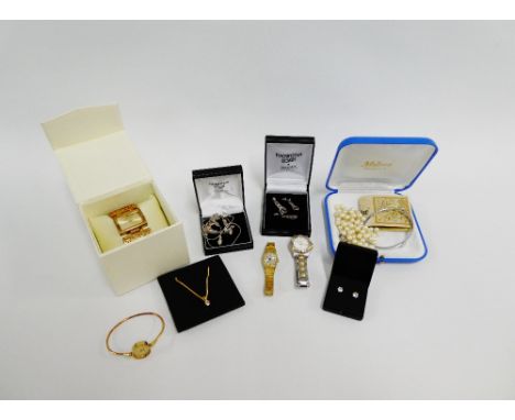 A mixed lot of gemset and paste jewellery to include a white metal bangle, stud earrings and matching pendant on gilt metal c