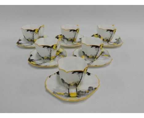 Set of six Shelley porcelain cups and saucers, registration number 723404, with printed backstamps comprising six cups and si