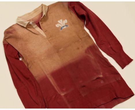 1923 WALES INTERNATIONAL JERSEY MATCH-WORN BY GWILYM MICHAEL Condition: fading to folded exposed areas, complete with No.14 t