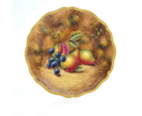 J Smith for Royal Worcester, a fruit painted plate, ogee gadrooned gilt rim, decorated with pears and grapes, 24cm diameter