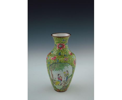 A 19th Century Cantonese enamel baluster vase, decorated with cartouche panels of fashionable ladies at leisure, scrolling fl