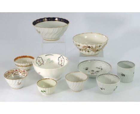 A collection of 18th century Worcester and other tea ware, including tea bowls, and slop bowls, wrythen moulded fluting and g