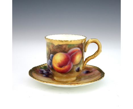 Horace Price for Royal Worcester, a fruit painted coffee cup and saucer, circa 1930,  decorated with peaches, grapes and berr