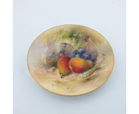 William Ricketts for Royal Worcester, a fruit painted plate, circa 1919, decorated with pears and grapes on moss covered grou