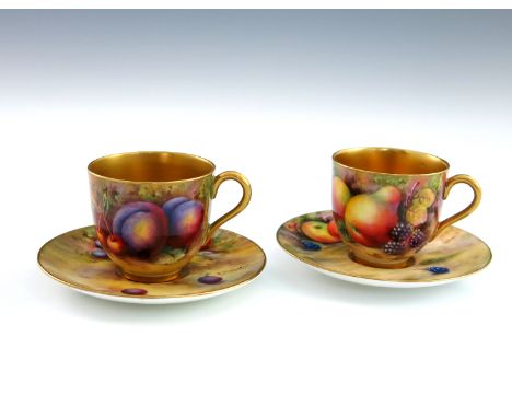 Edward Townsend for Royal Worcester, a fruit painted cabinet cup and saucer, circa 1926, decorated with plums, cherries and a