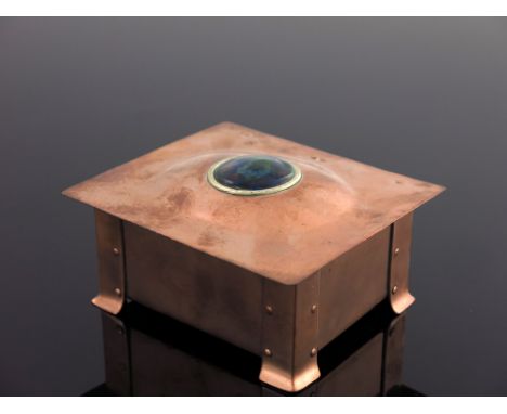 A E Jones, an Arts and Crafts copper and enamelled casket, circa 1905, cuboid form with slightly domed lid, set with a circul