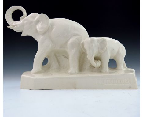 L Francois, an Art Deco ceramic figure group, modelled as elephants, white craquelure glaze, 46cm long, 29cm high