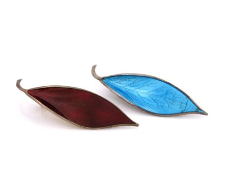 Willy Winnaess for David Andersen, two Norwegian silver gilt and enamelled leaf brooches, red and blue basse taille enamel, s