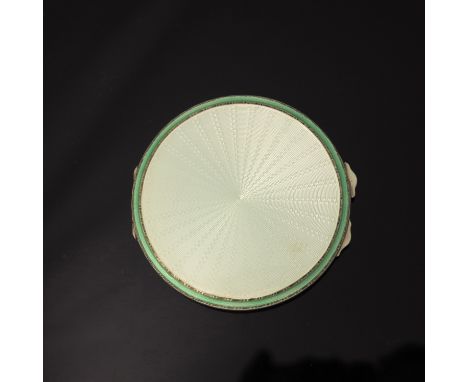 A George VI silver and enamelled compact, Adie Brothers, Birmingham 1937, circular form with pale green guilloche enamel radi