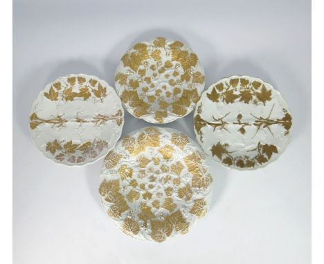 Two early 20th century Meissen grape plates, circular dished form, decorated in relief with fruiting vines, white glaze with 