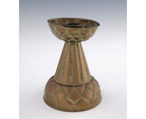 Ignatius Taschner, a Jugendstil brass candlestick, circa 1905, the ribbed conical body with embossed vertical bands, on a dom
