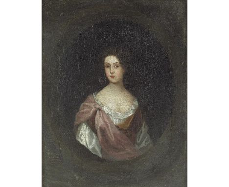 Follower of Sir Godfrey Kneller (1646-1723), Portrait of a Lady, oil on canvas, three quarter length in oval, 23 by 18cm, fra