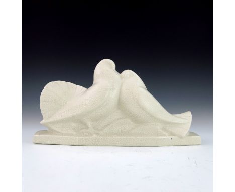 Edouard Cazaux for Orchies, an Art Deco ceramic figure group of two doves, white craquelure glaze, signed Dax, 36cm long