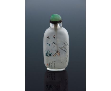 A Chinese opaque glass snuff bottle, internally painted with a bird on a prunus blossom branch, signed, jade stopper, 8cm hig