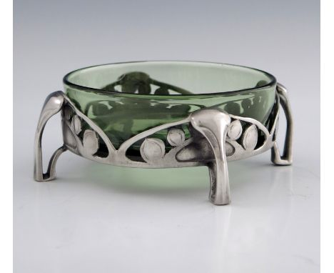 Archibald Knox for Liberty and Co., an Arts and Crafts Tudric pewter and Powell glass dish, model 0593, circa 1905, circular 