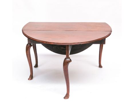 A George II red walnut drop leaf table, circa 1745, possibly Irish, the demi lune flaps supported on gate action legs, of cab