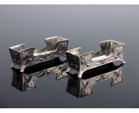 WMF, a pair of Jugendstil silver plated trough dishes, model 129, rectangular section stepped boat form, cast in relief with 