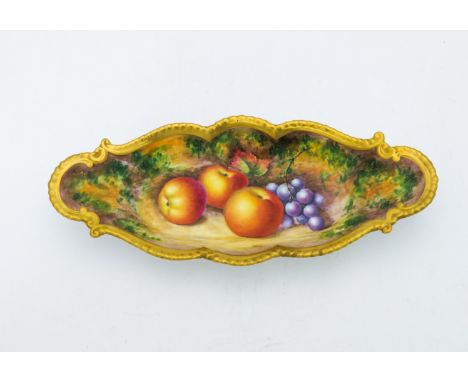 M Johnson for Royal Worcester, a fruit painted dish, circa 1960, elongated oval form, decorated with apples and grapes on mos