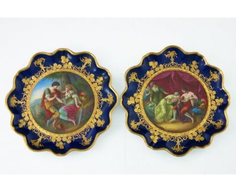 A pair of Vienna cabinet plates, late 19th Century, each painted with a names historical scene, King Edward I and Rinaldo and