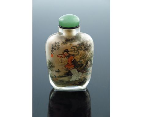 A Chinese clear glass snuff bottle, internally painted with a Geisha holding a fan in a landscape, signed, jade stopper, 7cm 