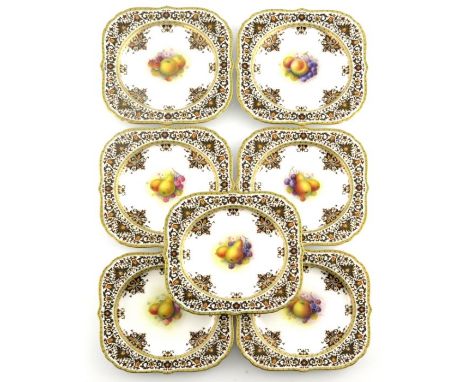 Arthur Schuck for Royal Worcester, a set of seven fruit painted dessert plates, 1921, square form, pears, cherries, blackberr