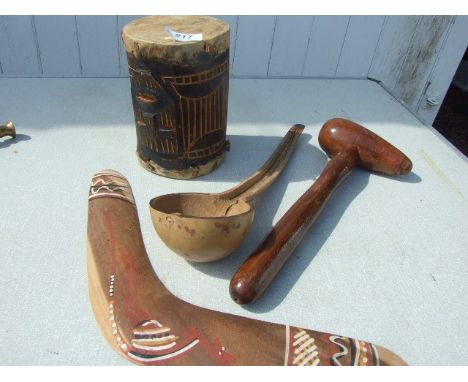 AN AFRICAN DRUM, A TRIBAL LADLE, A TRIBAL CLUB AND A BOOMERANG