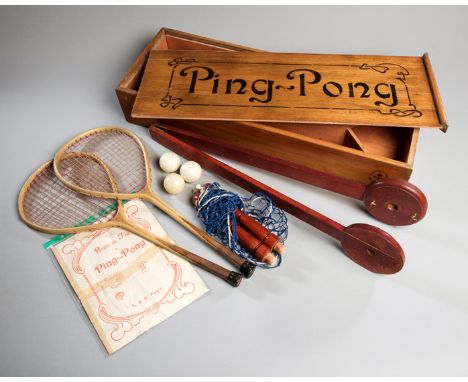 A French wooden- boxed set of “Ping-Pong” by S. & B., Paris, circa 1910,
the large varnished pine wooden box with sliding lid