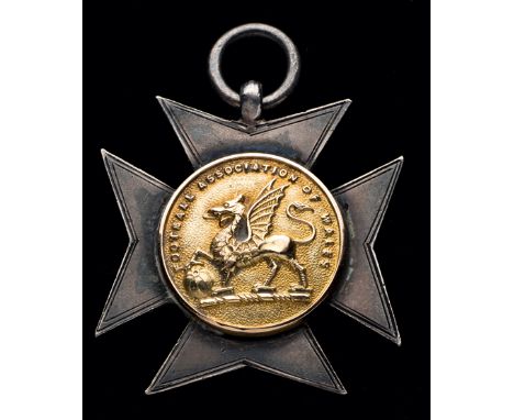 A silver FAW Welsh Cup runners-up medal 1910-11 awarded to a player of Connah's Quay & Shotton.
central design in silver-gilt