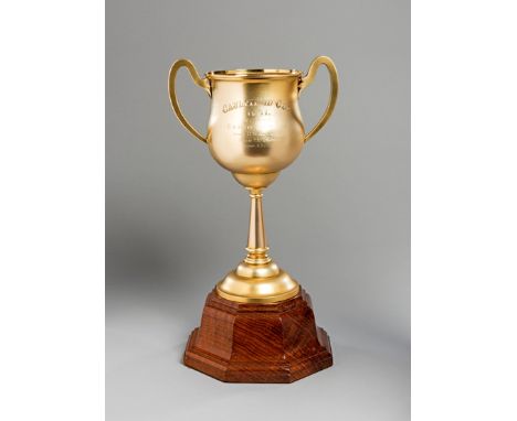 The 1931 Caulfield Cup,
an 18ct. gold two-handled trophy cup by T. Gaunt & Co., Melbourne, the bowl inscribed CAULFIELD CUP, 