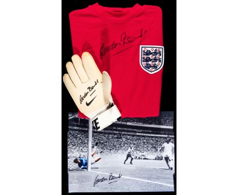A Gordon Banks signed shirt, glove and photoprint,
a Toffs red 1966 retro shirt, a right-hand Nike goalkeeping glove and  a 1