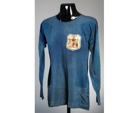 The blue Cardiff City jersey worn by Joe Nicholson in the F.A. Cup final v Sheffield United at Wembley Stadium 25th April 192