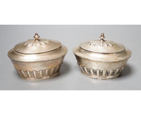 A matched pair of early 20th century silver oval tea caddies, London, 1908 &amp; 191, width 10.5cm and two early 20th century