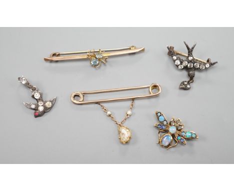 A modern 9ct gold and opal set bug brooch, 24mm, a paste set white metal swallow pendant and similar brooch and two yellow me