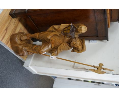 A carved wood figure of a gate keeper, height 110cm