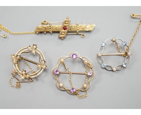 A late Victorian 9ct gold and gem set bar brooch, 43mm and a 9ct and seed pearl set open work brooch, gross 6 grams, a yellow