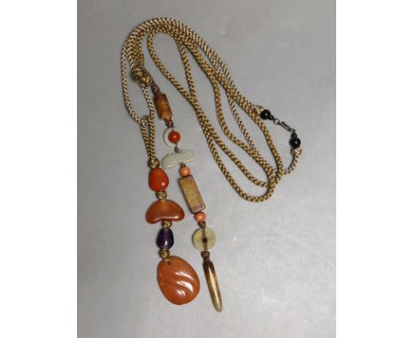 Kai Yin Lo, Hong Kong, A jade and coral mounted necklace and an agate and amethyst mounted necklace