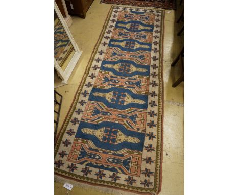 A Caucasian style blue ground runner, 264 x 90cm