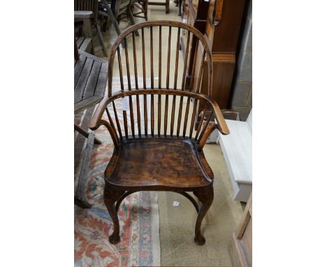 A Windsor elm and beech comb back elbow chair, width 59cm, depth 39cm, height 102cm