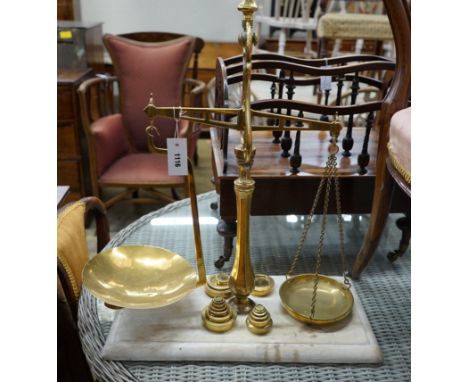 A set of Victorian brass balance scales with weights, height 69cm