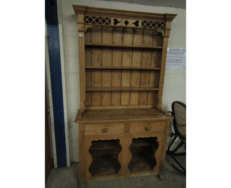 RUSTIC WAXED PINE KITCHEN DRESSER, THE TOP FITTED WITH THREE FIXED SHELVES WITH FRETWORK CARVED TOP, THE BASE FITTED WITH TWO