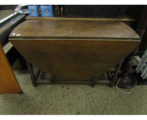 20TH CENTURY OAK CIRCULAR DROP LEAF GATE LEG TABLE WITH BOBBIN SUPPORTS 