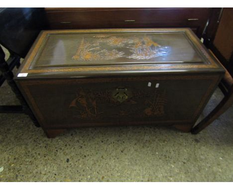 CHINESE HARDWOOD TRUNK WITH CARVED ORIENTAL SCENES TO TOP AND FRONT 