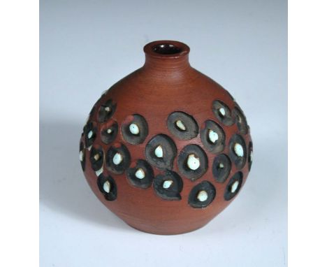 A small Poole stoneware vase by Guy Sydenham, with carved and glazed repeated circular patterns, impressed marks 10cm (4in)  
