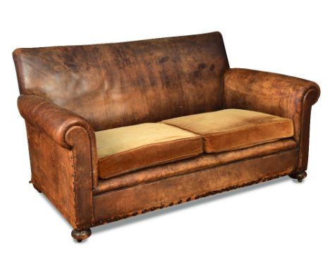 A 1930's two-seater leather club sofa, the tan leather upholstery with velvet cushions 76 x 150 x 85cm (30 x 59 x 33in)  