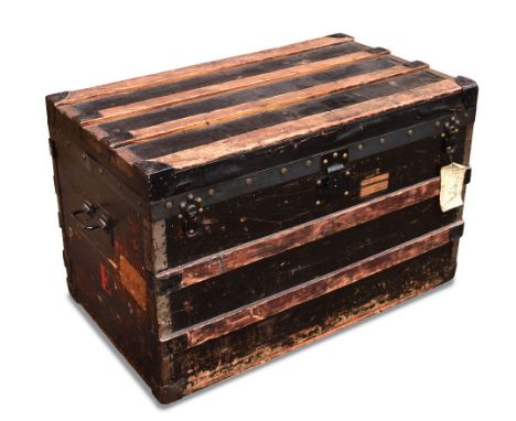 A late 19th or early 20th century Louis Vuitton steamer trunk, stamped marks to stud and brass work 57 x 90 x 52cm (22 x 35 x