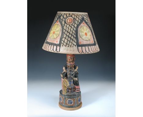 Quentin Bell, a Fulham Pottery figural lamp base and painted shade, the central column with two Spanish women standing back t