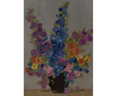 20th Century, a needlework embroidery depicting a still life arrangement of flowers, framed and under glass, measuring 38cm x