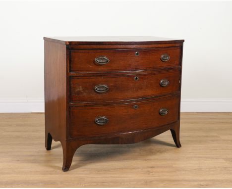 A REGENCY MAHOGANY BOW-FRONT THREE DRAWER CHESTOn splayed bracket feet; 100cm wide; 55cm deep; 89cm high